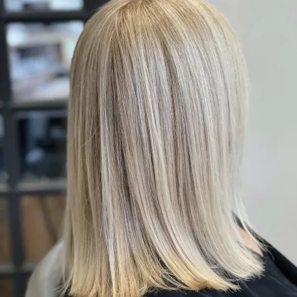 Blonde blunt bob with soft highlights
